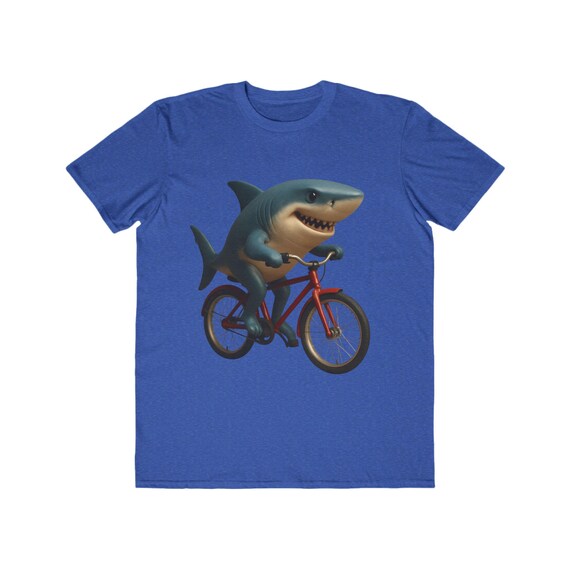 自転車に乗ったサメのグラフィックTシャツ、ノベルティサマーシャツ