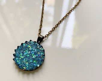 Teal glitter circle necklace with bronze chain