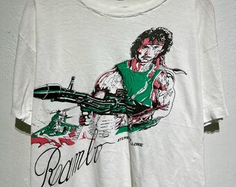 Vintage 80s Rambo Sylvester Stallone First Blood Action Movie Promo T Shirt 1980s John War Soldier Bazooka RPG Combat Film Cinema Heroes Tee