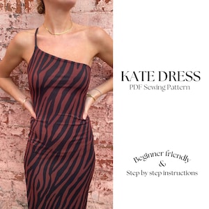 May include: A PDF sewing pattern for a one-shoulder dress called the "Kate Dress". The pattern is beginner friendly and includes step-by-step instructions. The dress is shown on a model wearing a brown and black zebra print dress.