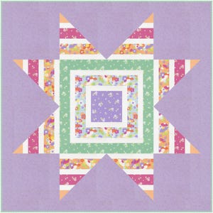 May include: A colorful star quilt block with a lavender background. The star features a central square and radiating points, incorporating floral and striped patterns in shades of pink, orange, green, and white. The block is approximately 12 inches square.