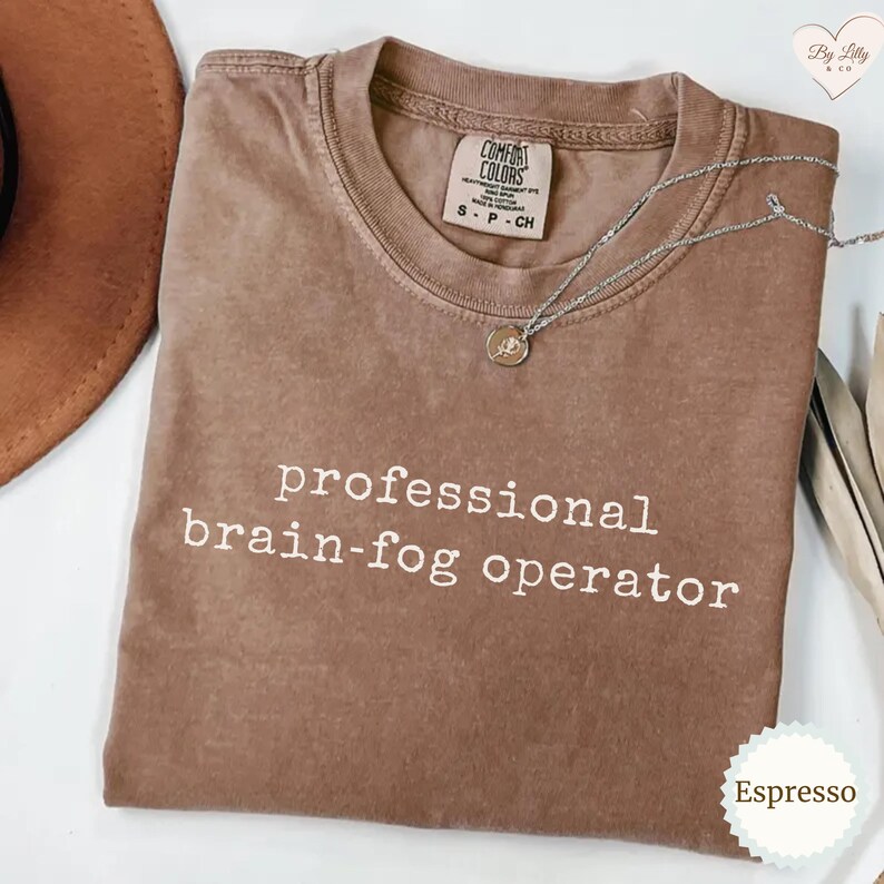 May include: A rustic wooden sign with the text "Welcome to our home" in white lettering. The sign has a distressed finish and a simple, inviting design, ideal for front door decor.