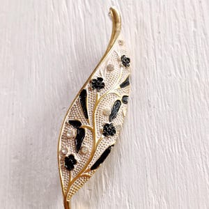 Vintage BSK signed brooch, white black enamel leaf design goldtone