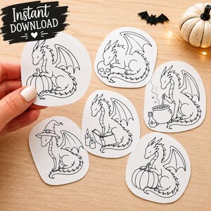 May include: A set of six white paper cutouts featuring black line art illustrations of dragons. The designs include dragons with a pumpkin, a skull, a cauldron, a witch hat, and an open book with candles. The text Instant Download is visible.