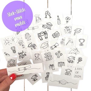 May include: A collection of small, square, white fabric patches with black line drawings of graduation-themed motifs. The patches include graduation caps, diplomas, champagne glasses, and the text "Class of 2026". A purple circle with the text "Stick+Stitch mini motifs" is in the upper left.