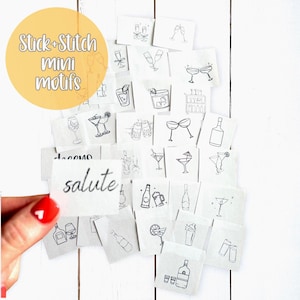 May include: A collection of small, square, off-white fabric patches with black line drawings of cocktail glasses, bottles, and other bar-related images. The text "Stick + Stitch mini motifs" is in a yellow circle. One patch reads "salute".