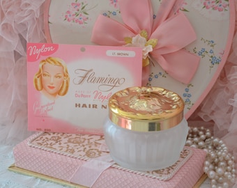 NEW OLD STOCK 1947 hair net in pink package & large ornate glass powder container, stunning duo!