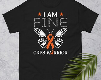 CRPS Krieger T-Shirt | Ich bin in feiner Orange Ribbon Schmetterling RSD Bewusstsein | Klassisches Unisex-T-Shirt für Chronische Schmerzen