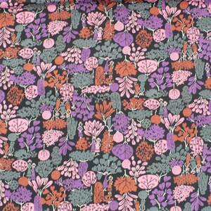 May include: A black fabric with a repeating pattern of stylized trees, flowers, and figures in shades of pink, purple, orange, and gray.