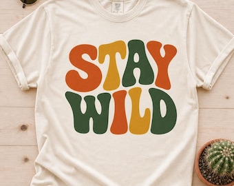 Stay Wild Retro 70s Groovy Graphic Tee | Boho Nature Lover Shirt, Cream Unisex T-Shirt