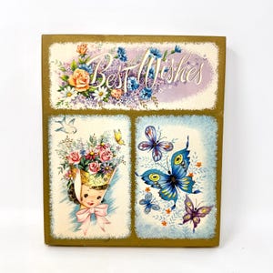 May include: Vintage greeting card with gold edging, featuring four panels. The top panel reads "Best Wishes" above a floral arrangement. Other panels depict a girl with flowers, a bird, and butterflies.
