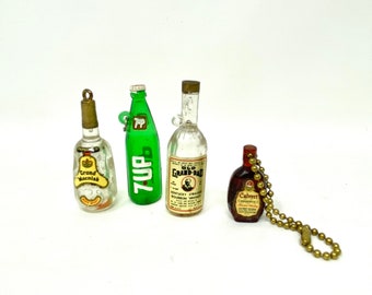 TWO Vintage Miniature Liquor Bottles, 7UP Bottle, Plastic Charms and Keychain