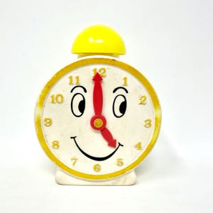 Vintage Anthropomorphic Clock Bank, Avon Bubble Bath
