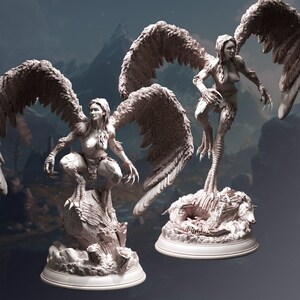 May include: Three detailed sculptures of a woman with bird wings and talons. The sculptures are in a neutral gray color and are posed in different stances. The sculptures are on circular bases.