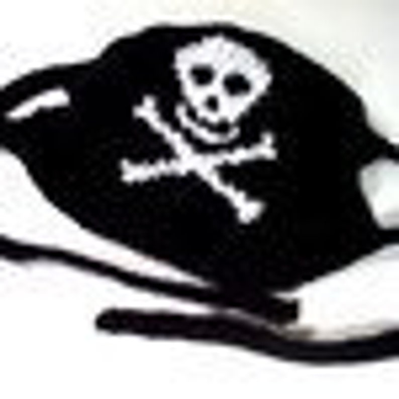 May include: Black crochet pirate eye patch with a white skull and crossbones design.