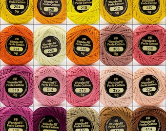 May include: A collection of 15 spools of WonderFil Perle Cotton thread in various colors, including yellow, orange, pink, red, brown, and beige. Each spool is labeled with the number 8, WonderFil, Perle Cotton, and a number indicating the color. The spools are arranged in a grid pattern.