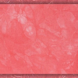 May include: A red fabric with a subtle, textured pattern. The fabric has a slightly faded, tie-dye effect.
