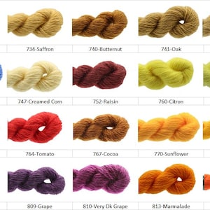 May include: A colour chart of yarn samples in various shades of yellow, orange, red, purple, blue, and green. Each yarn sample is labelled with a number and a colour name.