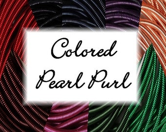 May include: Assortment of colored pearl purl in various colors, including red, green, purple, and copper.