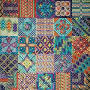May include: A colorful patchwork quilt with a variety of geometric patterns in shades of blue, green, purple, orange, and yellow.