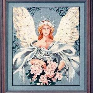May include: A cross stitch pattern featuring a white angel with a crown, holding a bouquet of pink roses. The angel is wearing a white gown with a blue sash and a white veil. The background is a light blue with a white border.