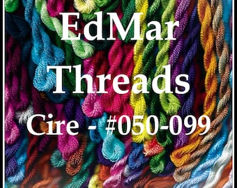 May include: A close-up of a variety of colorful embroidery floss spools, with the text "EdMar Threads Cire - #050-099".
