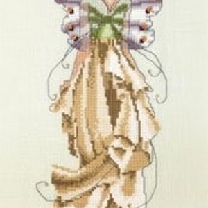 May include: A cross stitch pattern featuring a fairy with butterfly wings, a floral crown, and a flowing gown. The fairy is depicted in shades of brown, green, and white.