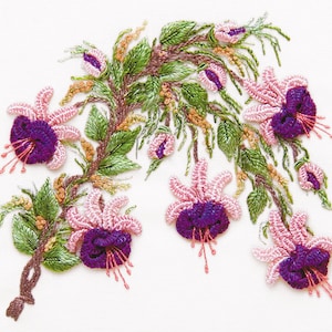 May include: Embroidered fuchsia flowers with pink and purple petals, green leaves, and brown stems. The flowers are arranged in a cascading pattern.