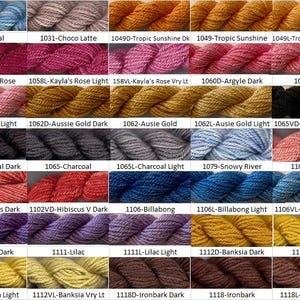May include: A color chart of yarn samples, showing a variety of colors and shades. The yarn is arranged in rows and columns, with each sample labeled with a number and a color name. The colors include coral, choco latte, tropic sunshine, Kayla's rose, argyle, charcoal, snowy river, hibiscus, billabong, lilac, banksia, and ironbark.