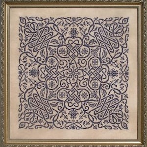 May include: A black and white cross stitch pattern with a geometric design featuring intricate knots and floral motifs.