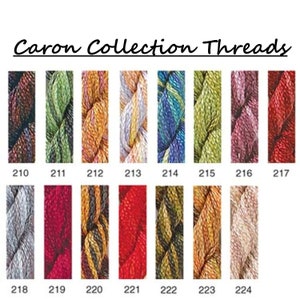 May include: A collection of Caron embroidery floss in various colors, including brown, green, yellow, blue, red, and beige. The floss is arranged in rows, with each row labeled with a number from 210 to 224.