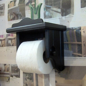 Black toilet paper holder with shelf