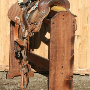 Solid pine saddle stand is Red Mahogany finished with polyurethane lacquer