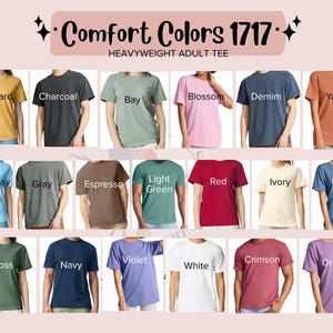 May include: A colour chart for Comfort Colors 1717 heavyweight adult tees, displaying eighteen short-sleeve shirts in various colours labelled Mustard, Charcoal, Bay, Blossom, Denim, Yam, Chambray, Gray, Espresso, Light Green, Red, Ivory, Blue Jean, Moss, Navy, Violet, White, Crimson, and Orchid.