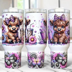May include: White tumbler featuring a cartoon calf with a purple bow, surrounded by flowers and butterflies. The design includes purple and pink accents, with a leopard print detail on the drink cups. The bottom of the tumbler showcases a floral and butterfly pattern.