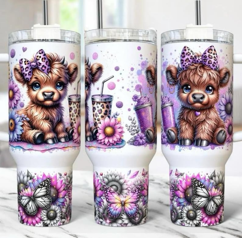 May include: White tumbler featuring a cartoon calf with a purple bow, surrounded by flowers and butterflies. The design includes purple and pink accents, with a leopard print detail on the drink cups. The bottom of the tumbler showcases a floral and butterfly pattern.