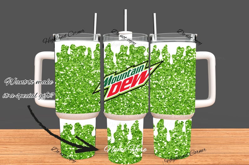 May include: A set of three insulated tumblers with white handles, lids, and straws. The tumblers feature a green glitter design with white drips and the Mountain Dew logo. Text includes "Want to make it a special gift?" and "Name Here."
