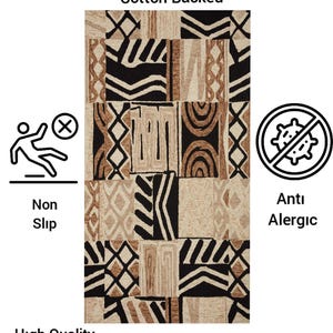 May include: A rectangular rug with a geometric pattern in black, tan, and cream. Features include a cotton backing, non-slip design, and anti-allergenic properties. It is machine washable and pet-friendly. Suitable for robot vacuums.