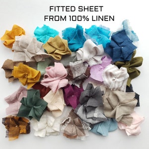 May include: A collection of fabric swatches in various colors and textures, including beige, brown, green, blue, pink, and purple. The swatches are arranged in a random pattern on a white background. The text "FITTED SHEET FROM 100% LINEN" is displayed at the top of the image.