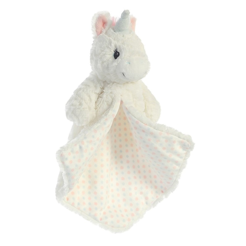May include: A white plush unicorn security blanket with a soft, textured body and a patterned blanket. The blanket features a cream background with pink and blue polka dots. The unicorn has a pink inner ear and a blue horn.