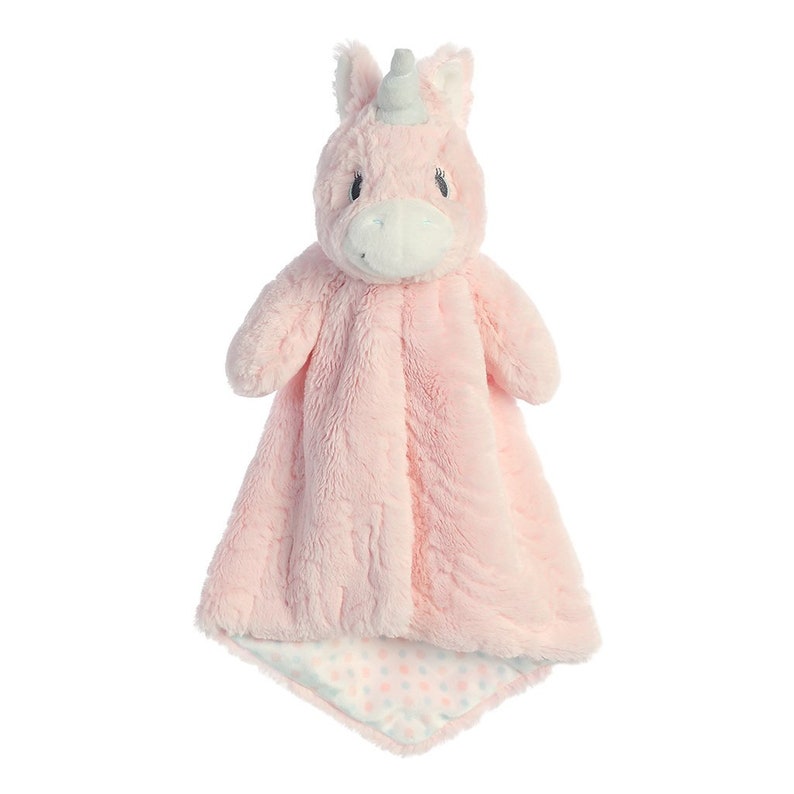 May include: A pink plush unicorn security blanket. The unicorn has a silver horn, white muzzle, and small black eyes. The blanket has a textured surface and a patterned underside with pink and blue dots.