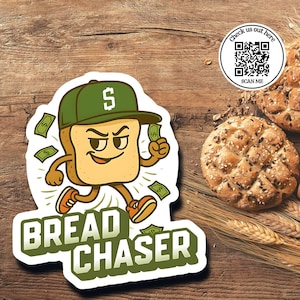 May include: A sticker with a cartoon bread slice wearing a green cap with a dollar sign, running and holding money. The text "BREAD CHASER" is below the bread. A QR code and the text "Check us out here" are in a circle.