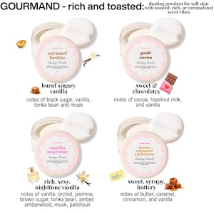 May include: Four jars of dusting powder with white puffs. The jars are labeled with the scents: caramel br&ucirc;l&eacute;e, posh cocoa, vanilla supreme, and warm caramel cashmere. Each jar has a pink label with the brand name and scent description. The text "GOURMAND - rich and toasted" is at the top.