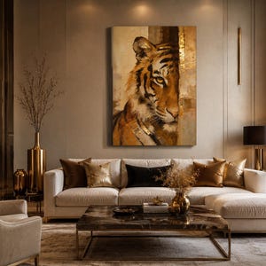 May include: An interior design scene featuring a large canvas painting of a tiger's face in shades of brown and gold. The painting hangs above a white sofa with decorative cushions. A coffee table and gold accents complete the room.