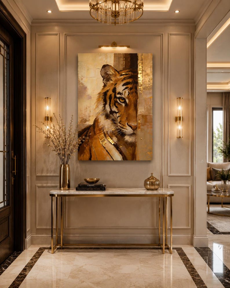 May include: An entrance hall with a tiger painting, a marble-topped console table with gold legs, and a decorative vase. The walls are beige with gold sconces, and the floor is marble. The painting has gold accents.