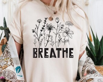 Camiseta Breathe: Estampado floral, camiseta de meditación positiva