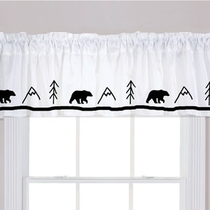 May include: White valance with a black trim and a repeating pattern of black bears, mountains, and pine trees.