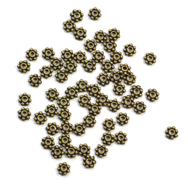 Daisy Spacers 4mm Antique Bronze Plated Pewter - 100