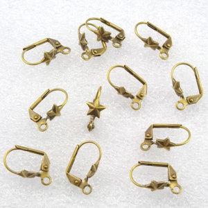 May include: Ten gold-toned earring hooks with star-shaped accents. The hooks are designed to be used with jewelry making supplies.