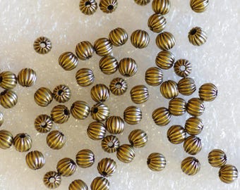 4 mm Nahtlose massive antike Messing tief gewellte runde Perlen - 50 Stück